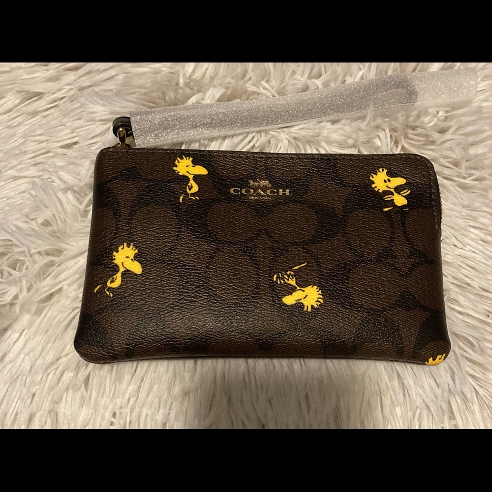Coach Peanuts Woodstock Wristlet